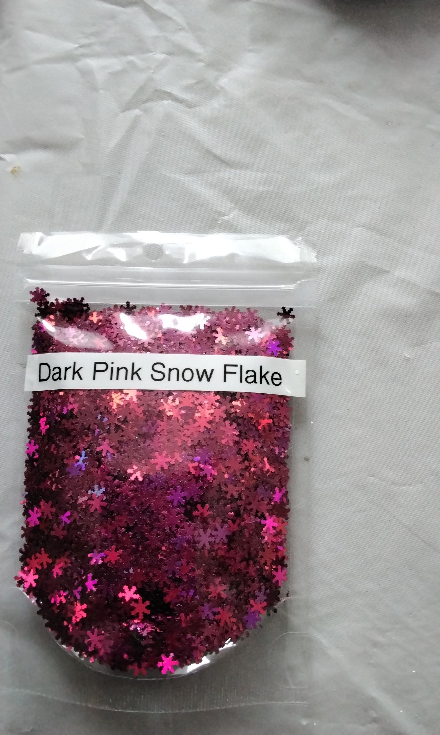 Dark pink snowflake